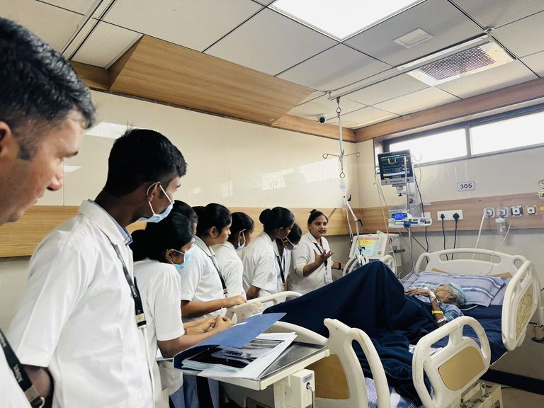 Students on clinical posting at the bedside in Pawana Multi-Speciality Hospital