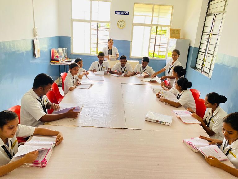 Students reading in the library at A.S.M.T. School of Nursing